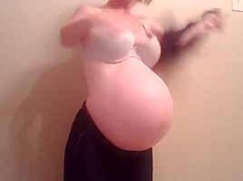 Sexy pregnant dwarf milking her tits befor the real flow