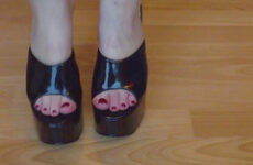 Ballbusting mistress in black platform mules