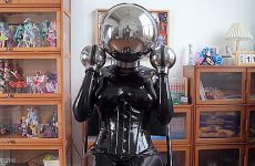 Girl In Latex And Metal And Chastity Belt With Vibrator